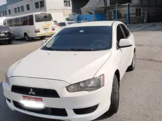 2014 Mitsubishi Lancer in Abu Dhabi used car