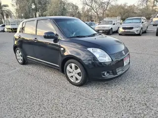2011 Suzuki Swift في Abu Dhabi سيارة مستعملة