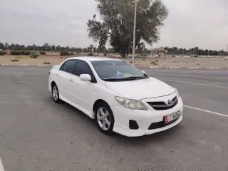 2013 Toyota Corolla في Abu Dhabi سيارة مستعملة