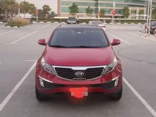 2013 Kia Sportage في Abu Dhabi سيارة مستعملة
