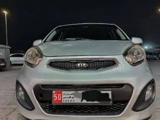 2013 Kia Picanto في Abu Dhabi سيارة مستعملة