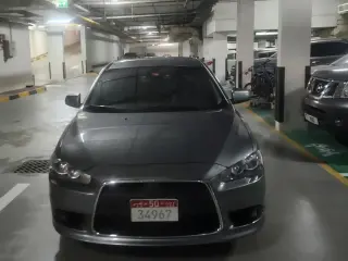 2013 Mitsubishi Lancer in Abu Dhabi used car
